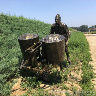 用獨(dú)輪車(chē)運(yùn)糧的農(nóng)夫