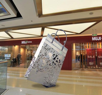 商店廣場(chǎng)室內(nèi)擺放鏤空不銹鋼購物袋雕塑